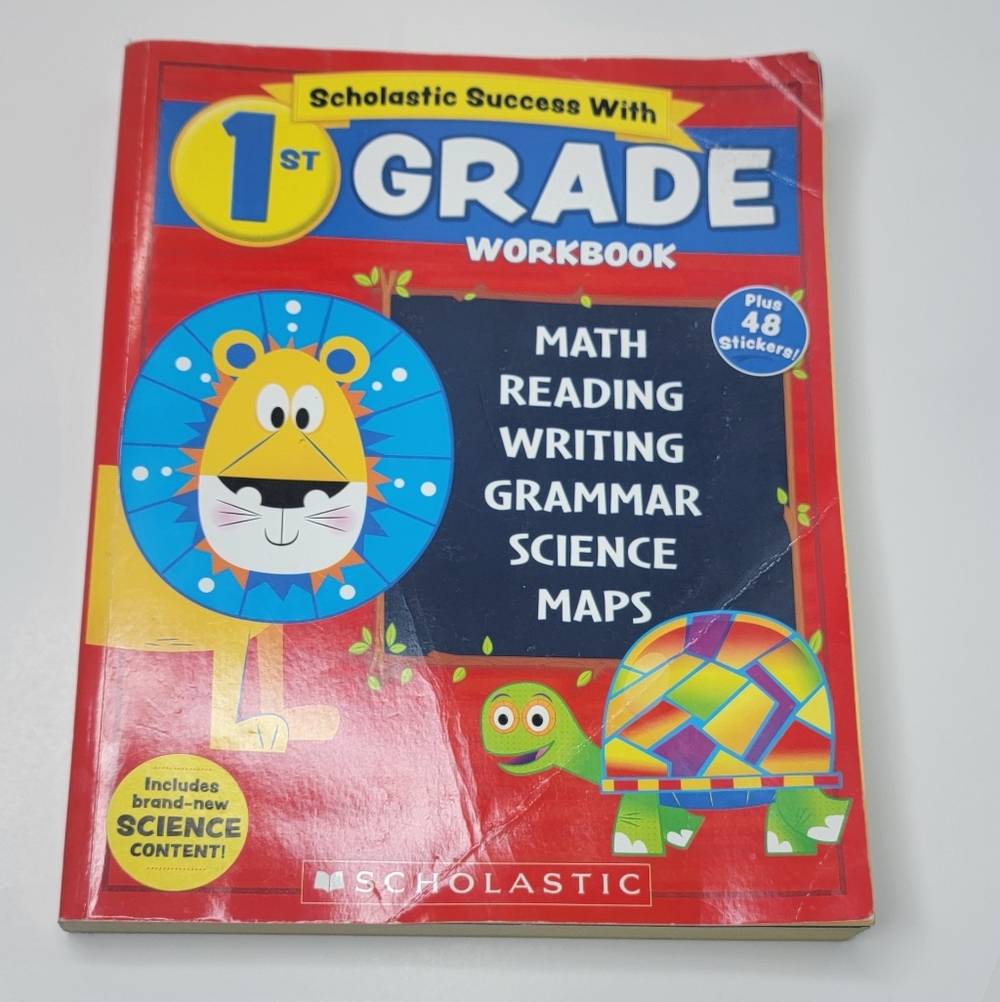 Scholastic 1st Grade Workbook with Red and Blue Cover